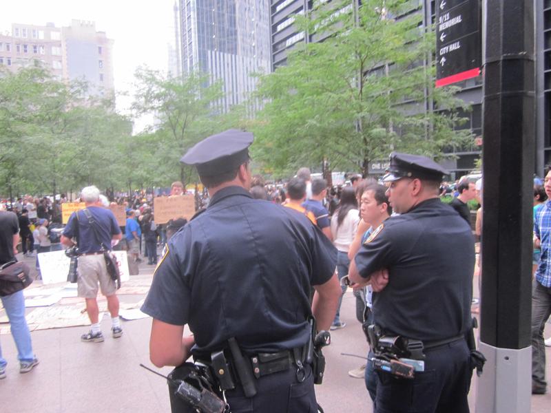 Police watching over the demonstrators in Zuccotti Park